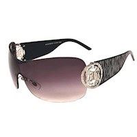 Moderigtig m�rk solbrille med linser i Polycarbonat. Flotte st�nger med safari-print.